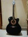 Signature Topaz 265 Semi-Acoustic black guitar.